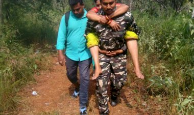 Muslim cop carries two devotees on back for medical aid at Tirumala.