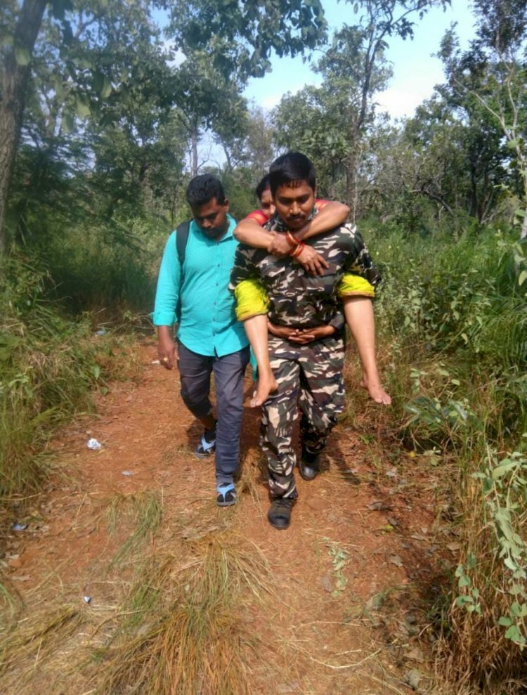 Muslim cop carries two devotees on back for medical aid at Tirumala.