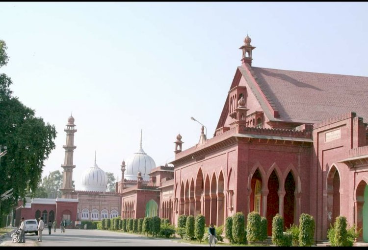 AMU students and teachers distribute clothes as part of centenary celebration